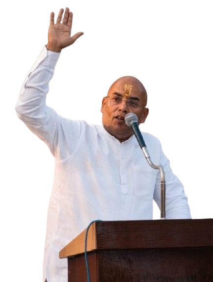 Baba Mitra leader speaking at a public event